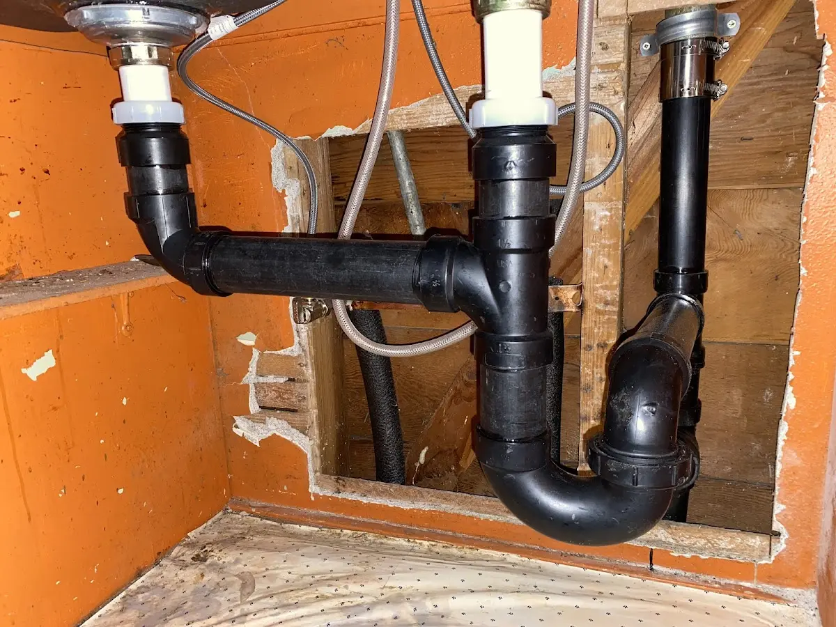 Professional Garbage Disposal Repair equipment and tools on the job in Uniontown